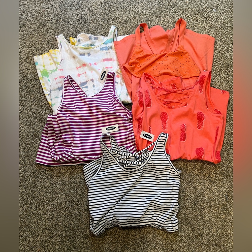 5 pieces. 4 rompers and 1 dress sz 14 Old Navy. Total 5 pieces. NWT